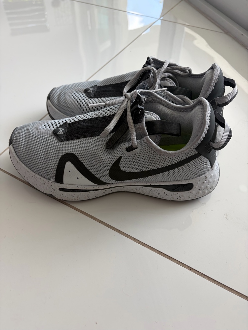 Nike Men’s Grey and Black basketball shoes